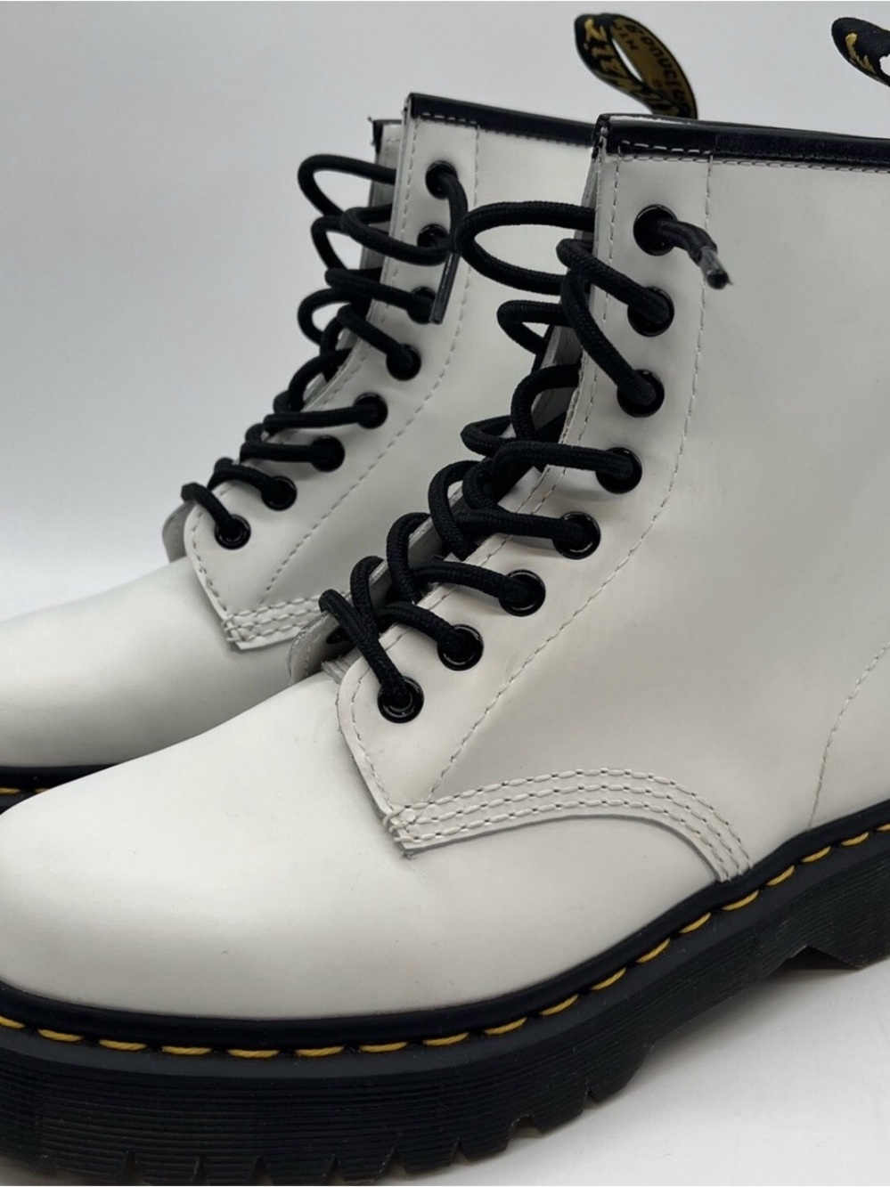 Dr. Martens White Leather Lace-Up Combat Boots with Black Accents
